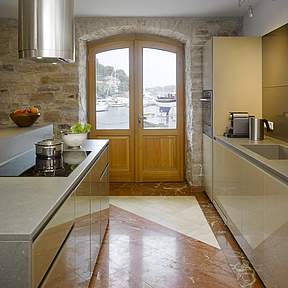 Kitchen opens directly to the seaside terrace