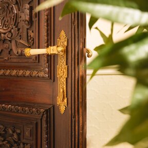 Detail of historic wooden door at the hotel