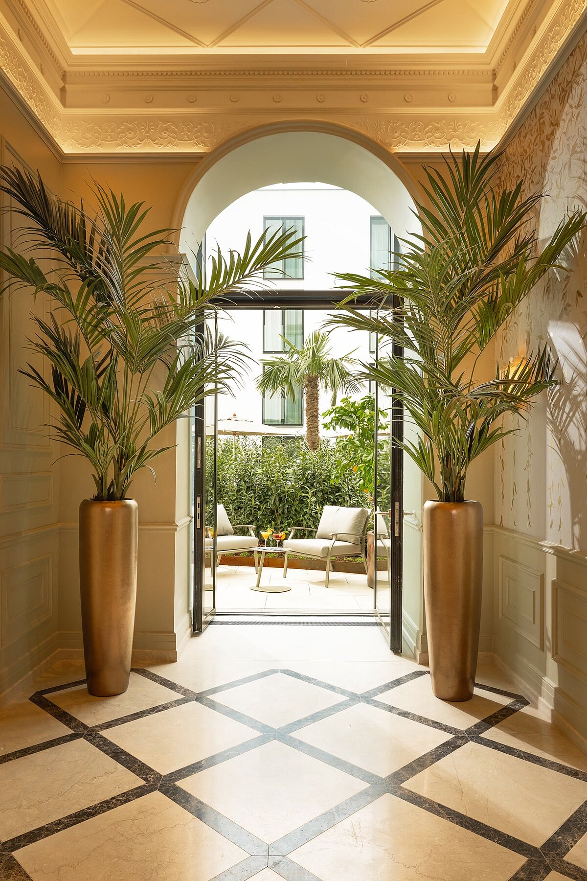 Doors opens to Inner Garden of EST Hotel Palais Chotek
