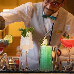 Bartender at EST Hotel Palais Chotek mixing exotic cocktails