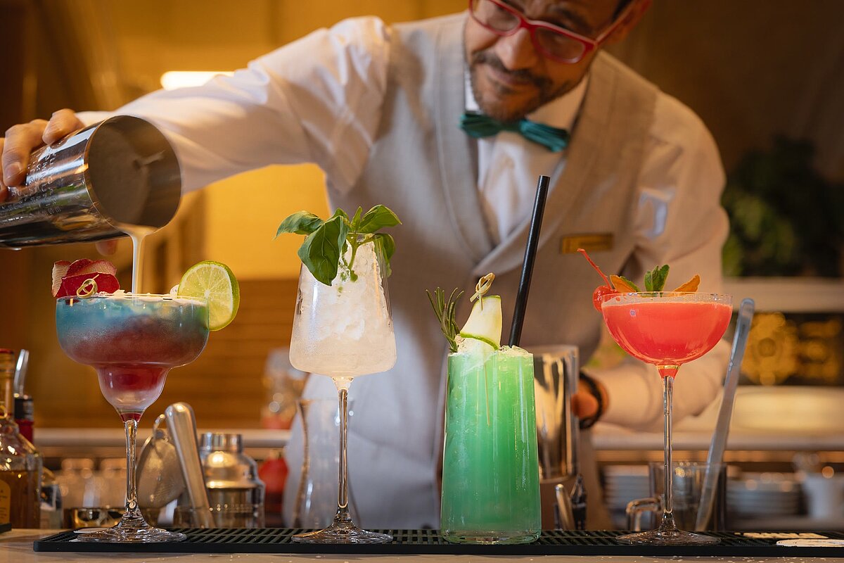Bartender at EST Hotel Palais Chotek mixing exotic cocktails