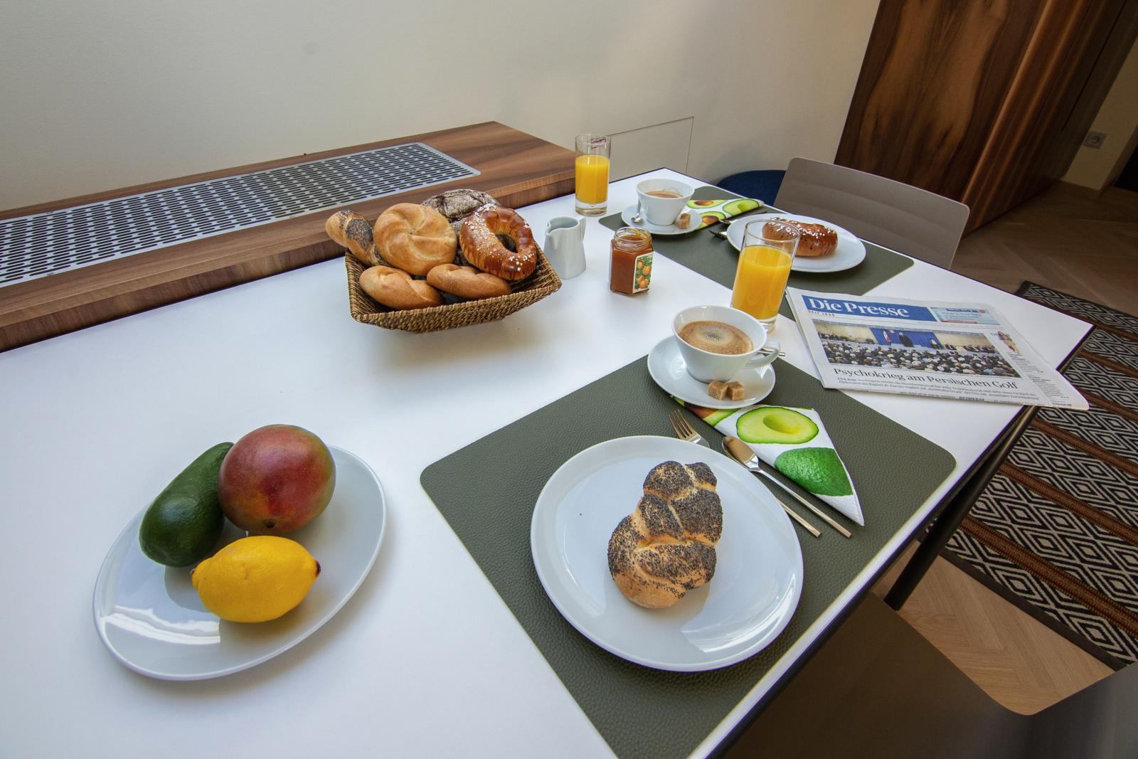 est residences studio apartments dining table with breakfast